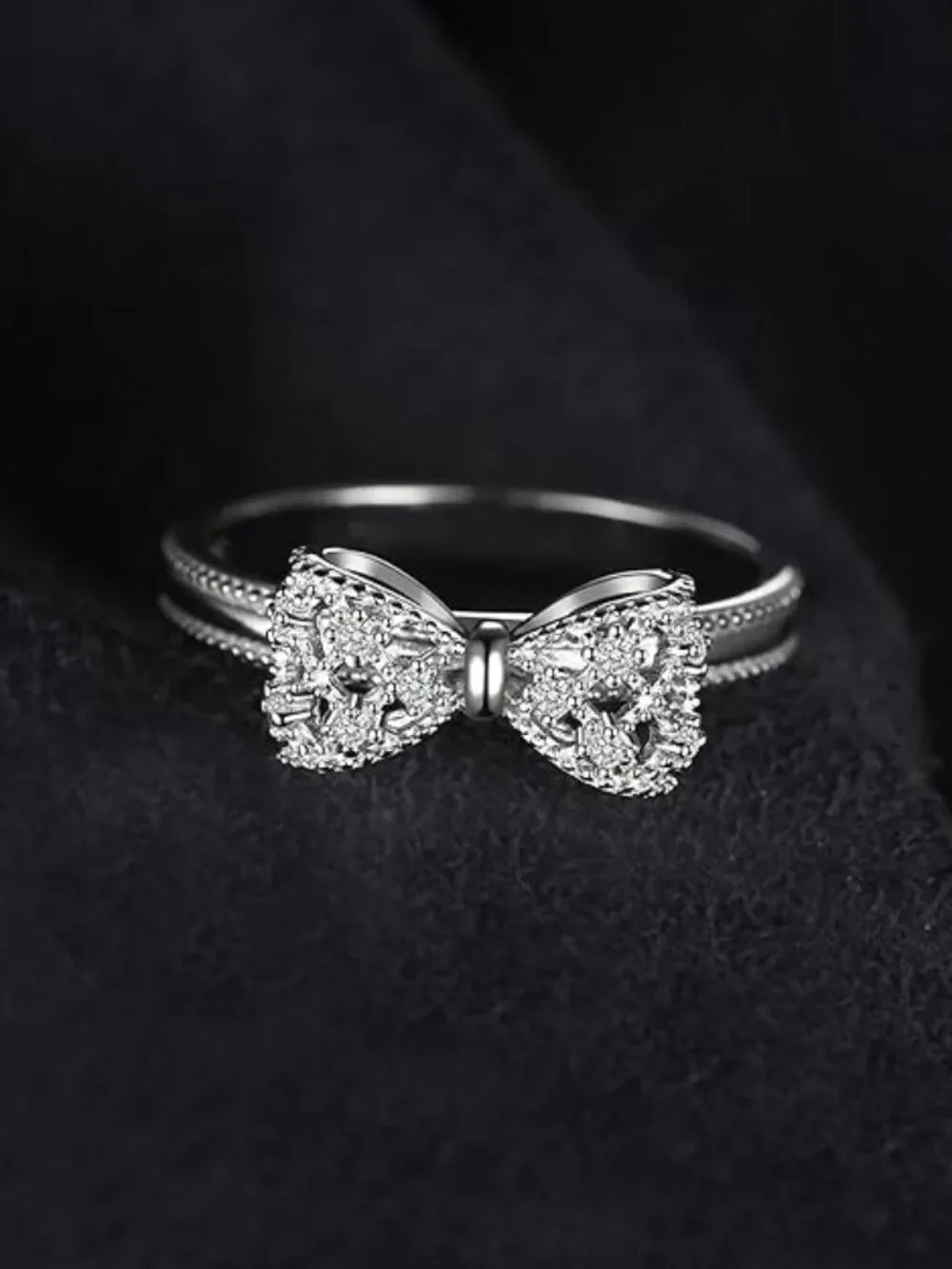 .925 Sterling Silver with White Diamond Cubic Zirconia Infinity Forever Bow Ring